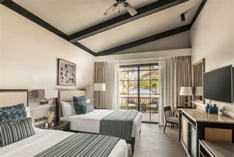 Rooms available at Dusit Thani Lubi Plantation Resort .